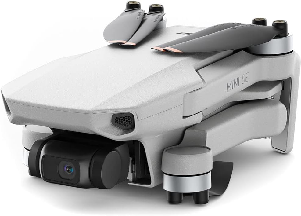 DJI Mini SE Fly More Combo - Drone Quadcopter with 3-Axis Gimbal, 2.7K Camera, GPS, 30 Mins Flight Time + 64GB Memory Card, Landing Pad + Pilot Bundle (Renewed)